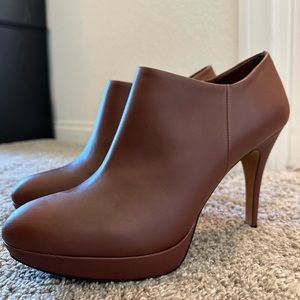Brown, heeled booties with gold zipper! Never been worn! Super cute!!